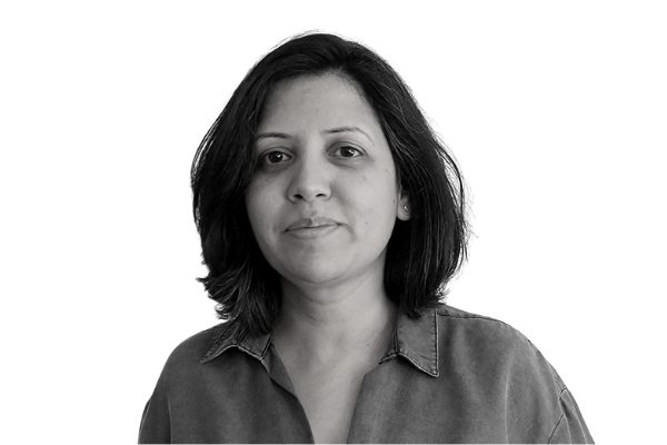 Penetration testing specialist Reshma in black and white looks at camera